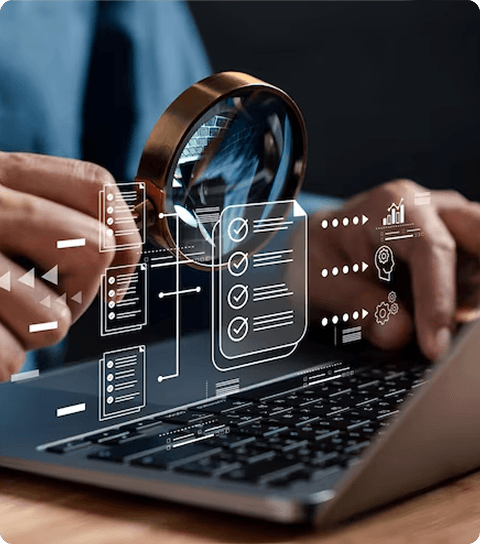 Man using laptop with digital magnifying glass over documents