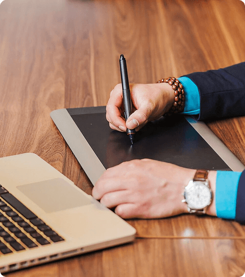 Close up of person electronically signing on a tablet with stylus