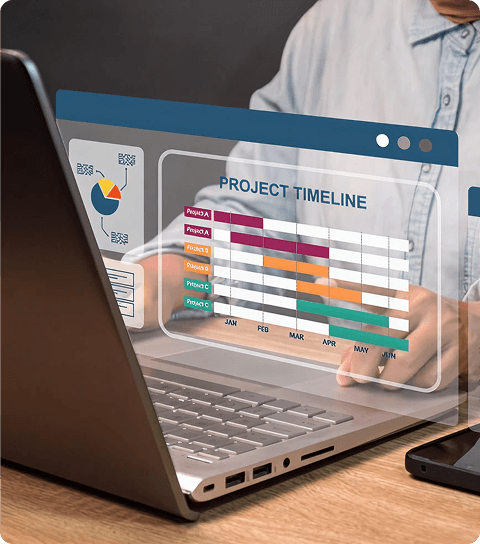 Laptop screen showing master batch record design timelines