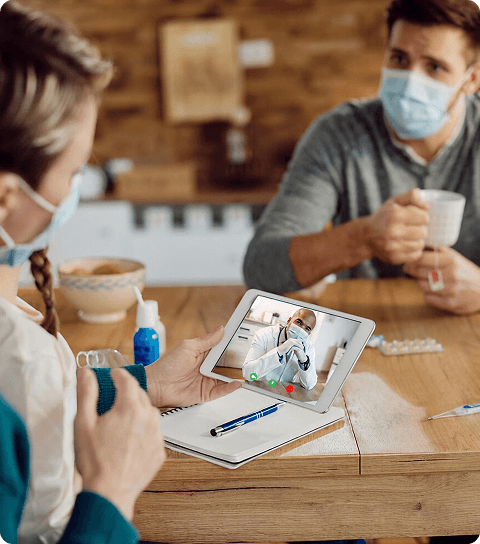 Patient having a follow-up consultation with a dentist over a video call