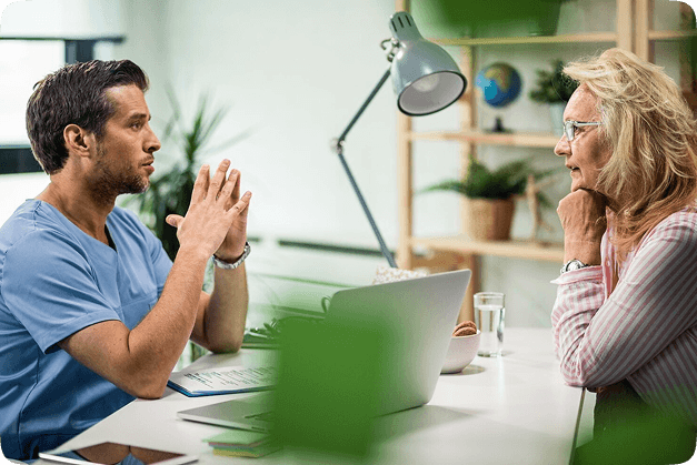 Healthcare professional consulting with a patient in a modern dental clinic